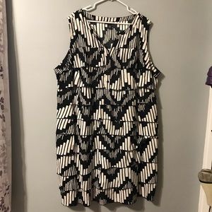 Ruffled and fully lined black and white dress.